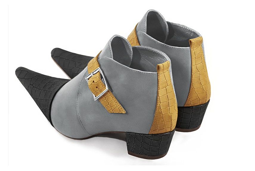 Dark grey and mustard yellow women's ankle boots with buckles at the front. Pointed toe. Low cone heels. Rear view - Florence KOOIJMAN